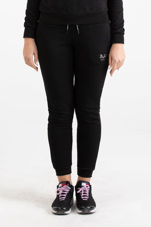 Close-up view of black Versace 19.69 joggers for women featuring a drawstring waist and small silver 19V69 Italia logo on the thigh.