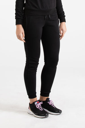 Close-up view of black Versace 19.69 joggers for women featuring a drawstring waist and small silver 19V69 Italia logo on the thigh.