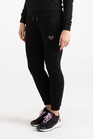 Close-up view of black Versace 19.69 joggers for women featuring a drawstring waist and small silver 19V69 Italia logo on the thigh.