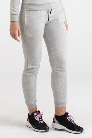 Front view of heather grey Versace 19.69 joggers for women featuring a black 19V69 Italia logo on the thigh and ribbed ankle cuffs.